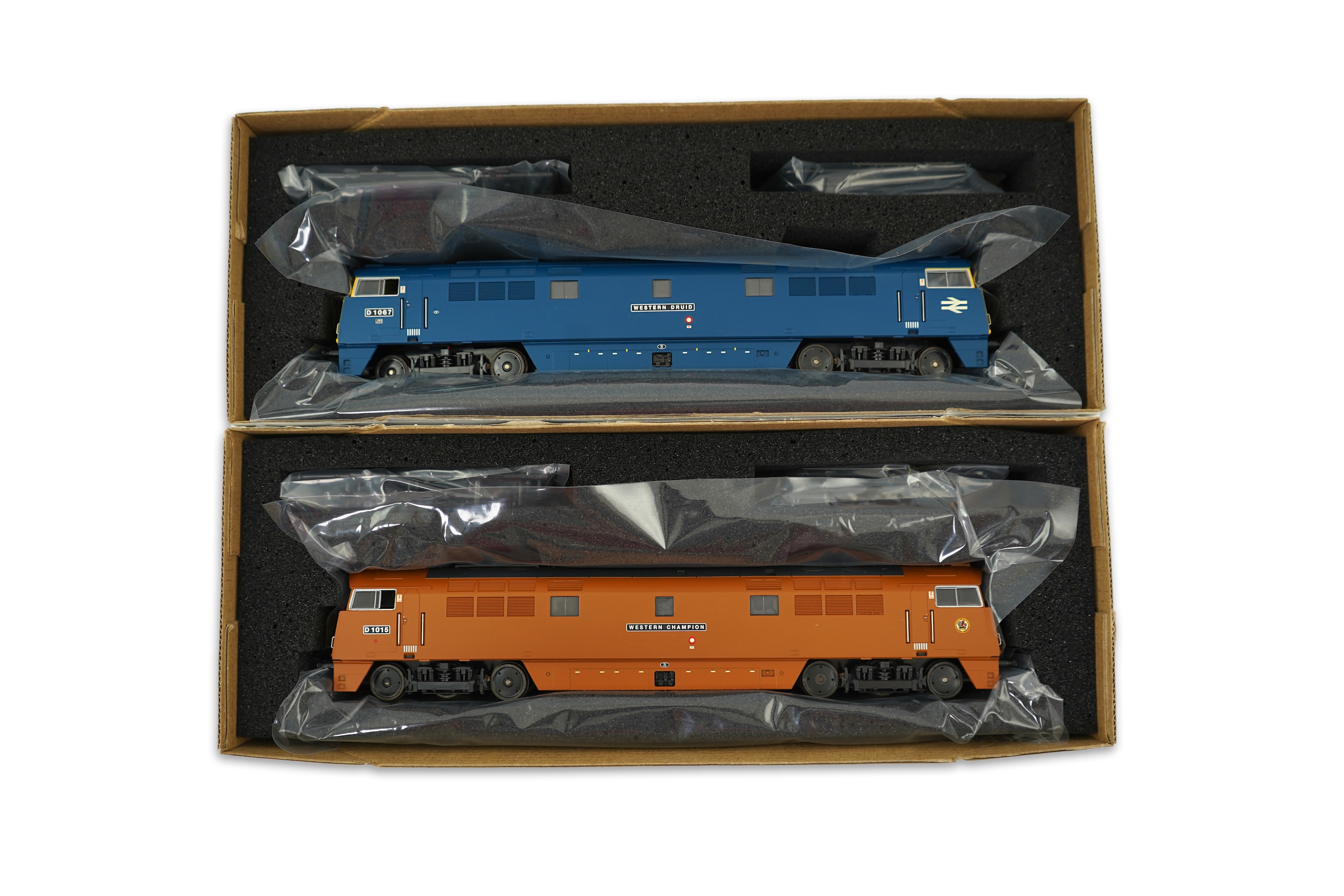 Two boxed Heljan 00 gauge railway BR Class 52 Co-Co diesel-hydraulic locomotives; Western Druid D1067 (5202) and Western Champion D1015 (5203)